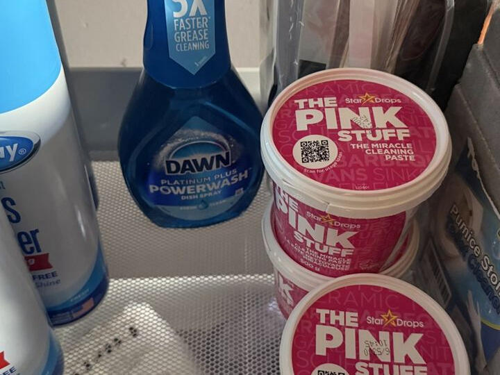 Dawn Powerwash spray and tubs of The Pink Stuff cleaning paste